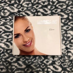 Luminess airbrush makeup tool.